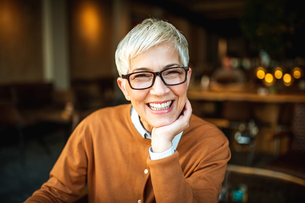 Smiling Woman with Glasses